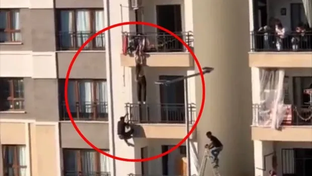 Diyarbakır'da dahşet anları! Balkondan düşmek üzere olan kız çocuğunu katları tırmanarak kurtardı